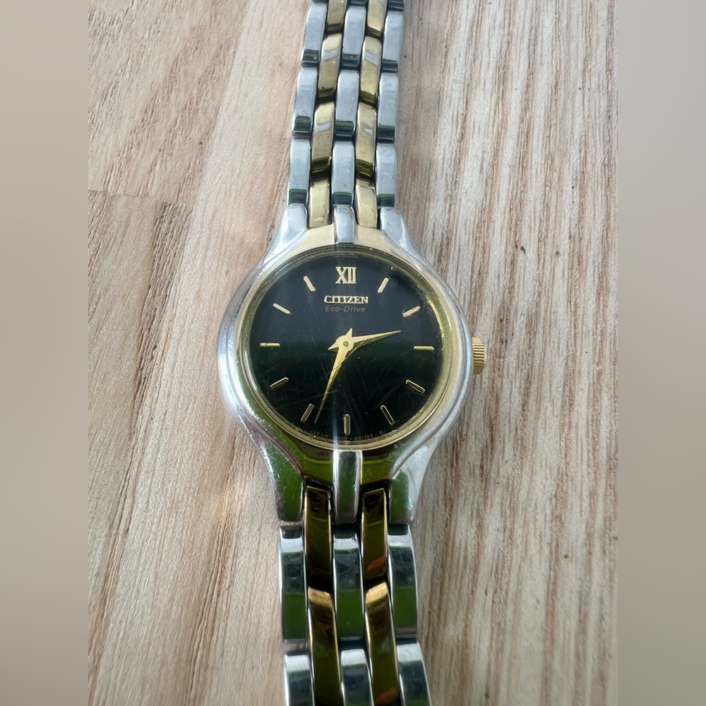 Citizen eco-drive ladies black dial two toned solar dress watch